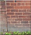 Benchmark cut into house wall, Clipston Terrace, Meanwood, Leeds