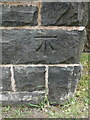 Benchmark on Holy Trinity church, Rhostyllen