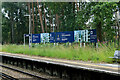 Sign proclaiming Upper Longcross at Longcross station