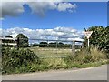 Field gate at road junction