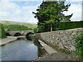 SE0498 : Rebuilt river wall in Grinton by Stephen Craven
