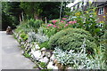SJ8490 : A walk in Didsbury village (80) Didsbury Park flowerbed by Tom Jolliffe