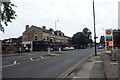 A Walk in Didsbury Village (88) Shell Garage and shops opposite