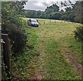 ST3998 : White van in a field, Llanllowell, Monmouthshire by Jaggery