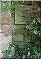 Benchmark cut into bridge parapet, Ripon