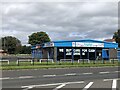 NZ2587 : Empty car showroom, Morpeth Road, Ashington by Richard Webb