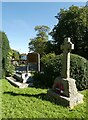 SU0986 : All Saints, Lydiard Millicent: war memorial (churchyard) by Basher Eyre