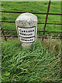 Old Milestone by the A595, north east of B5305 crossroads