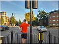 Stop ULEZ protestor outside Bounds Green Station