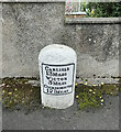 NY2344 : Old Milestone by the former A595 in Bolton Low Houses by Barbara Todd
