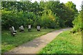 Carved seats by the Green Wheel