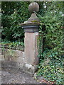 SJ3373 : Stone pillar by the entrance to Puddington Hall by John S Turner