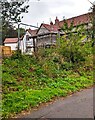 Fenced-off house under scaffolding, Tytherington, South Gloucestershire