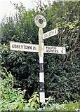 NY1449 : Direction Sign - Signpost at Highlaws by B Todd
