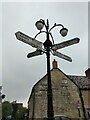 Direction Sign - Signpost in The Square in Tisbury