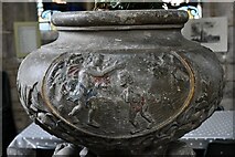TF3024 : Moulton, All Saints Church: The Adam and Eve font 1719 (detail) 1 by Michael Garlick