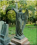 SE2639 : Angel with cross in the old part of Lawnswood Cemetery by Humphrey Bolton