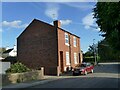 Brick houses at the south end of Jerry Clay Lane