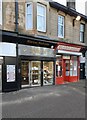NS5574 : Campbell Jeweller and Milngavie Barbers by Richard Sutcliffe
