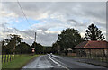 Sign for Filleigh village hall, and a bus stop