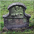 A symbolic gravestone at Hobkirk Parish Churchyard