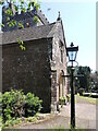 ST4793 : An old lamppost outside St Thomas à Becket by Neil Owen