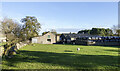 NZ0932 : Buildings and bales at Hoppyland Farm by Trevor Littlewood