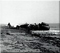TA4011 : Wreckage at Spurn by Gerald England