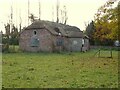 Disused thatched bungalow