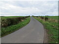 Minor road and farmland between Ravelaw and Whitsome Laws