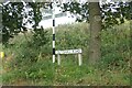 Signpost & Coltishall Road sign