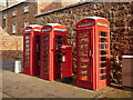 NH7656 : Telephone boxes and postbox, Fort George by Craig Wallace