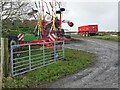 NY8365 : Colourful farm machinery at the Tofts by Oliver Dixon