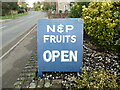 SU8799 : N & P Fruits Board outside Hildreths in Wycombe Road by David Hillas