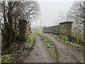 SJ7848 : Farm track over old railway bridge by Jonathan Hutchins