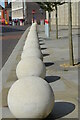 SJ9223 : A line of concrete spheres by Rod Grealish