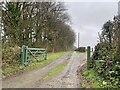 Private road to an enclosure near Park Wood