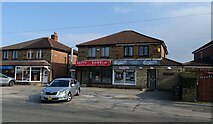 SJ6699 : Businesses on Warrington Road (A574) by JThomas