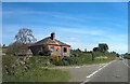 Stone Cottage on road junction