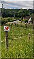 Red squirrel direction sign near Dingestow