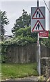 Welsh Labour placard behind warning signs, Llanover Road, Blaenavon