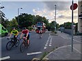 Cyclists crossing the bridge over the River Lea