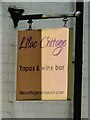 Sign for the Lilac Cottage Tapas & Wine Bar, Prestbury