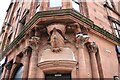 Sculpture above the entrance to bank