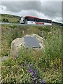 Large boulder next to the A55 with commemorative plaque, Crymlyn