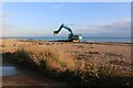 Mechanical excavator working on Bay 83, Eastbourne, East Sussex