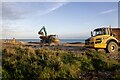 Loading a dump truck on Bay 83, Eastbourne, East Sussex