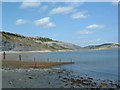 A view from East Cliff Beach across to Charmouth and Stonebarrow Hill