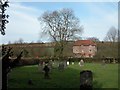 The Manor Farm House at Priors Dean from the Churchyard