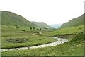 NY2217 : Newlands Beck meanders down Newlands valley by Nigel Davies